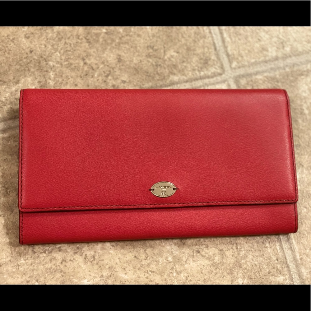 Woman’s wallet with passport holder.